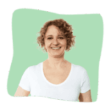 service-cta-right Smiling woman with curly hair wearing a white shirt, in front of a green abstract background